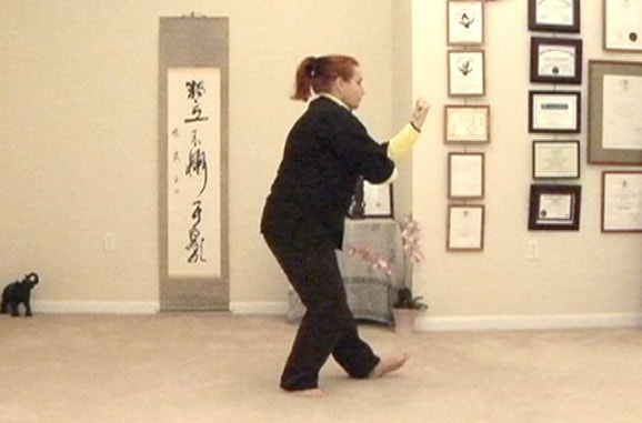 Ranna demonstrates the start of 2nd 3rd Yang Lo Chan long form Tai Chi. © All rightes reserved.